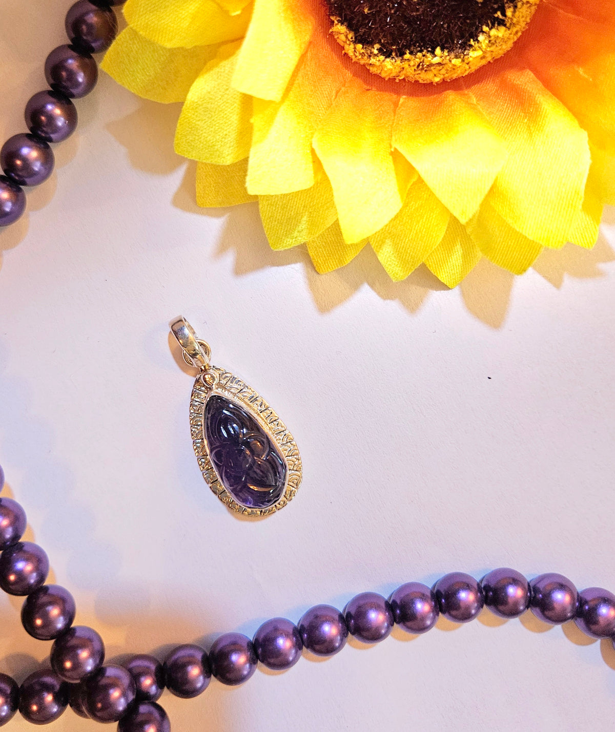 Carved Amethyst Drop Pendant