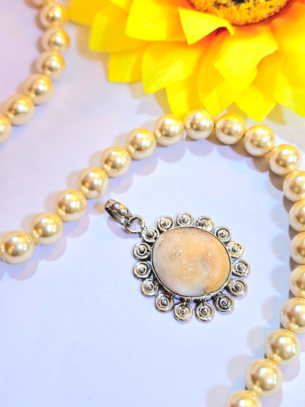 Gomti Chakra Silver Pendant