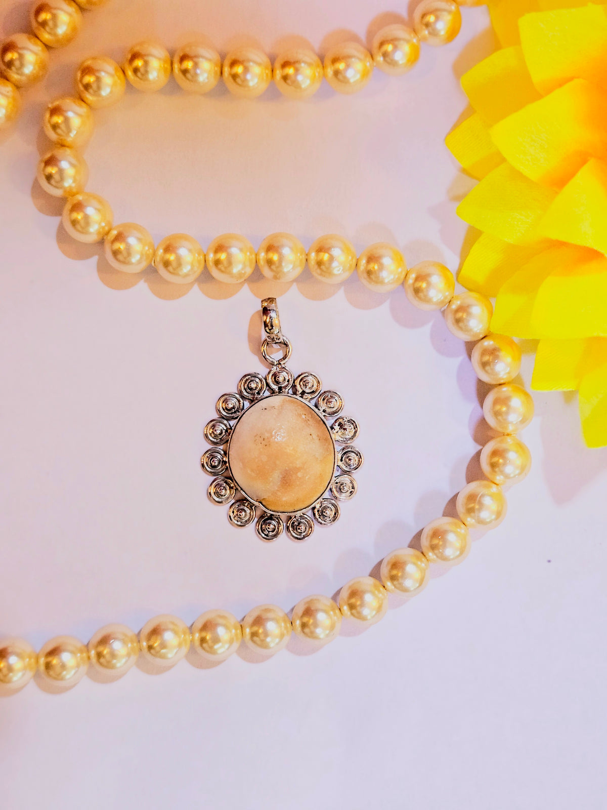 Gomti Chakra Silver Pendant