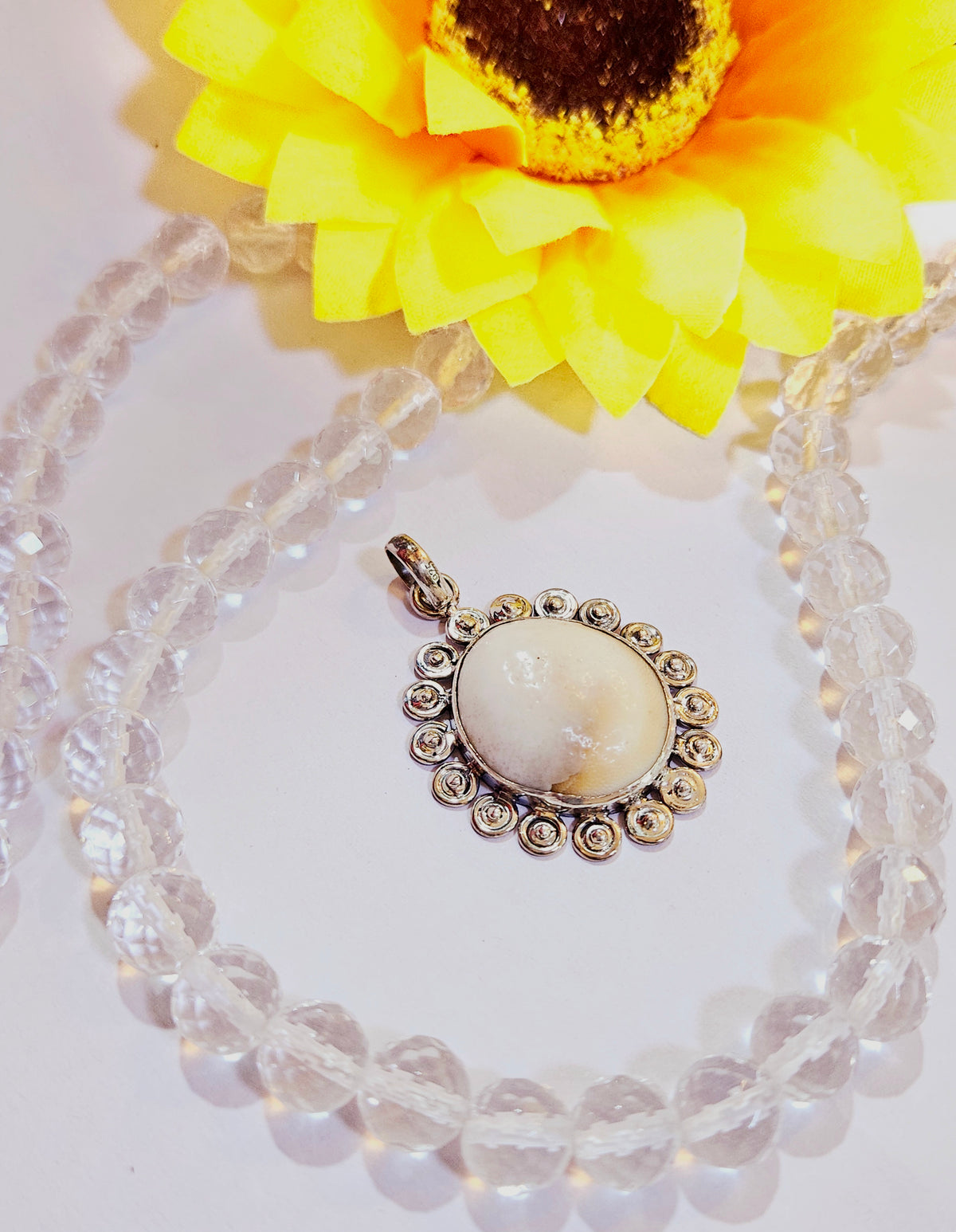 Gomti Chakra Silver Pendant